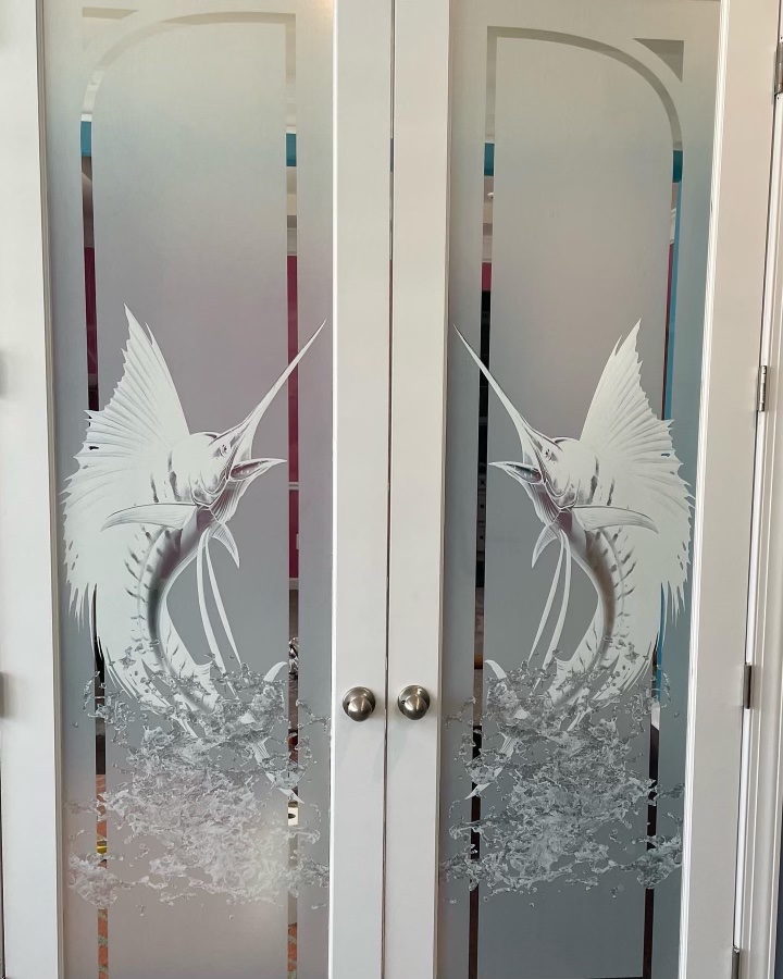Custom decorative etched marlin design on frosted glass doors in Rehoboth Beach